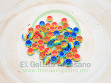 Cargar imagen en el visor de la galería, Acr Bola Rayada Multicolor
